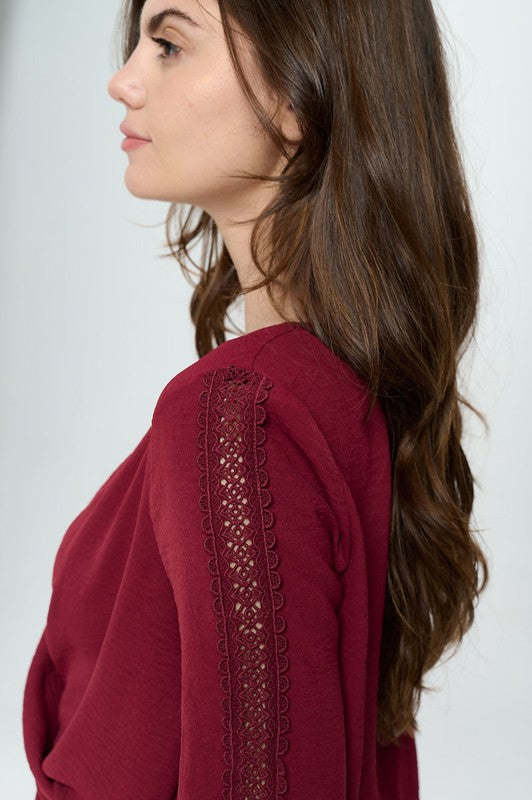 Surplice long sleeve with lace insert blouse