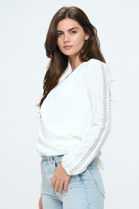 Surplice long sleeve with lace insert blouse